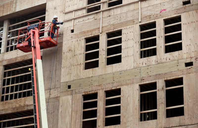 Construction workers on a rooftop