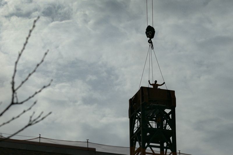 Architectural rendering or photo of a modern building, highlighting new commercial or residential construction.