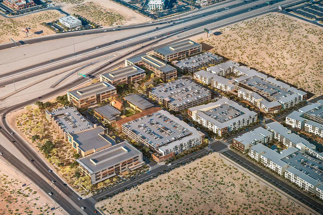 Architectural rendering or photo of the UnCommons mixed-use development, a large-scale commercial and residential construction project.