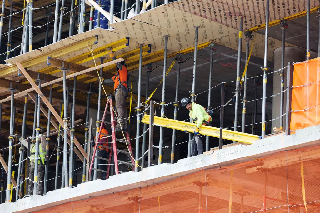Construction workers wearing masks